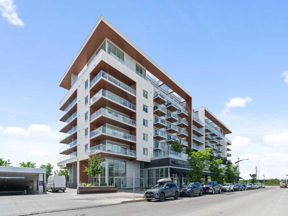 215, 8505 Broadcast Avenue SW Calgary AB T3H 6B5 | MLS #A2144623 MLS #A2144623 image #0