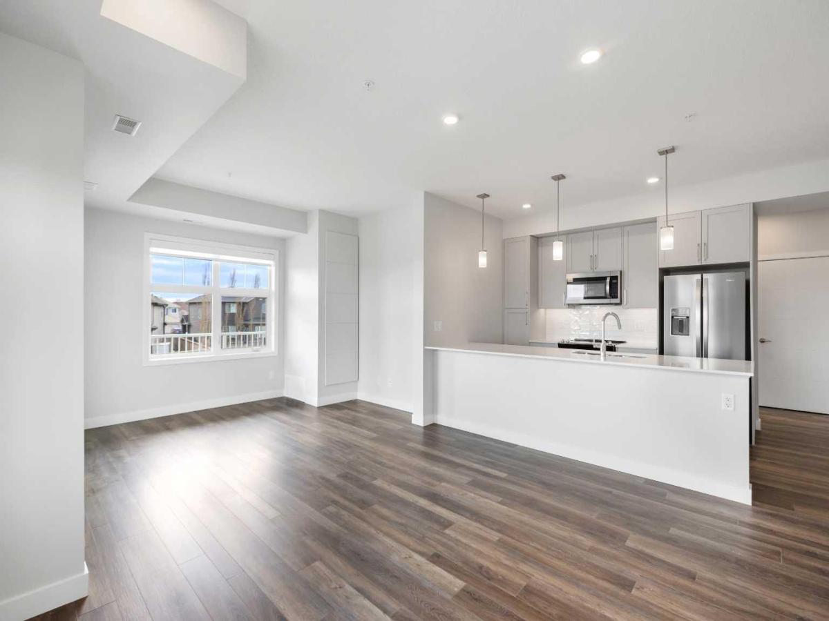 202, 255 Les Jardins Park SE Calgary AB T2C 5V3 | MLS #A2235018 MLS #A2235018 image #0
