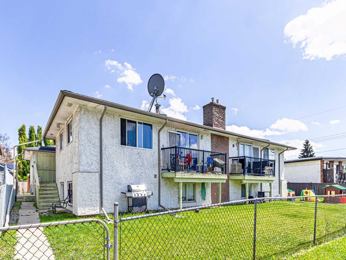 1-6, 8 Huntley Close NE Calgary AB T2K4Z3 MLS #A2244388 MLS #A2244388 image #0