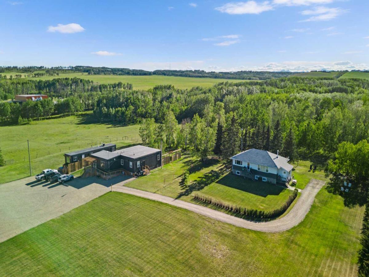 281029 Range Road 42 Rural Rocky View County AB T4C 1A6 MLS #A2267022 MLS #A2267022 image #0
