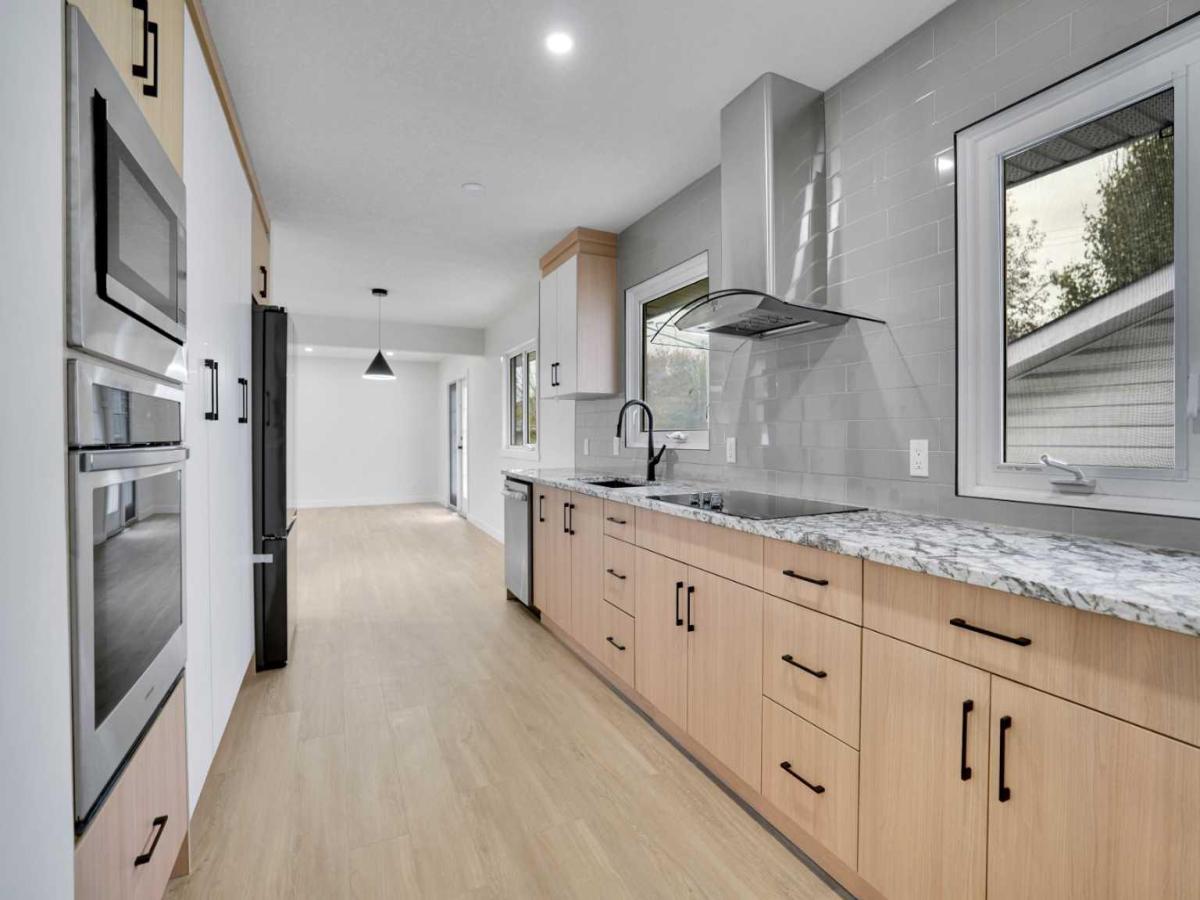 6116 Buckthorn Road NW Calgary AB T2K 2Z1 MLS #A2262388 MLS #A2262388 image #0