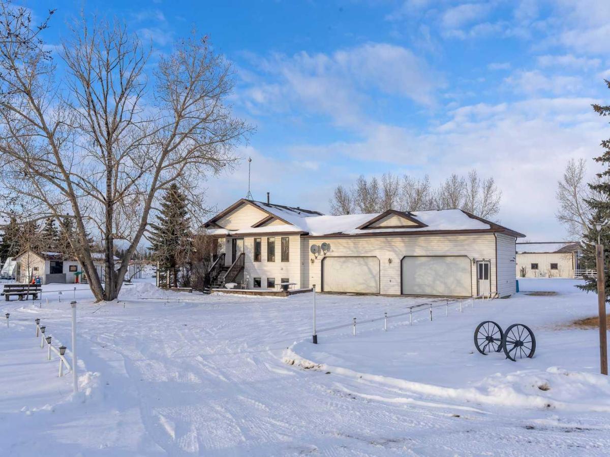 283058 Township Road 245A Rural Rocky View County AB T2M 4L5 MLS #A2274342 MLS #A2274342 image #0
