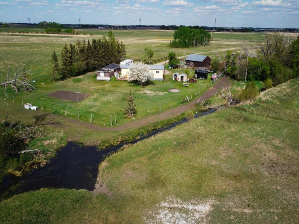 240141 Range Road 274 Rural Rocky View County AB T1X 2H9 | MLS #A2306777 MLS #A2306777 image #0