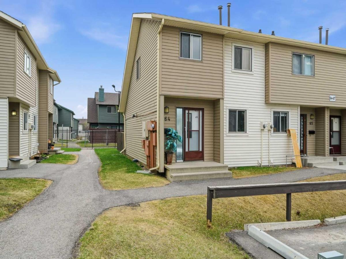 64, 2519 38 Street NE Calgary AB T1Y 4W8 | MLS #A2307314 MLS #A2307314 image #0