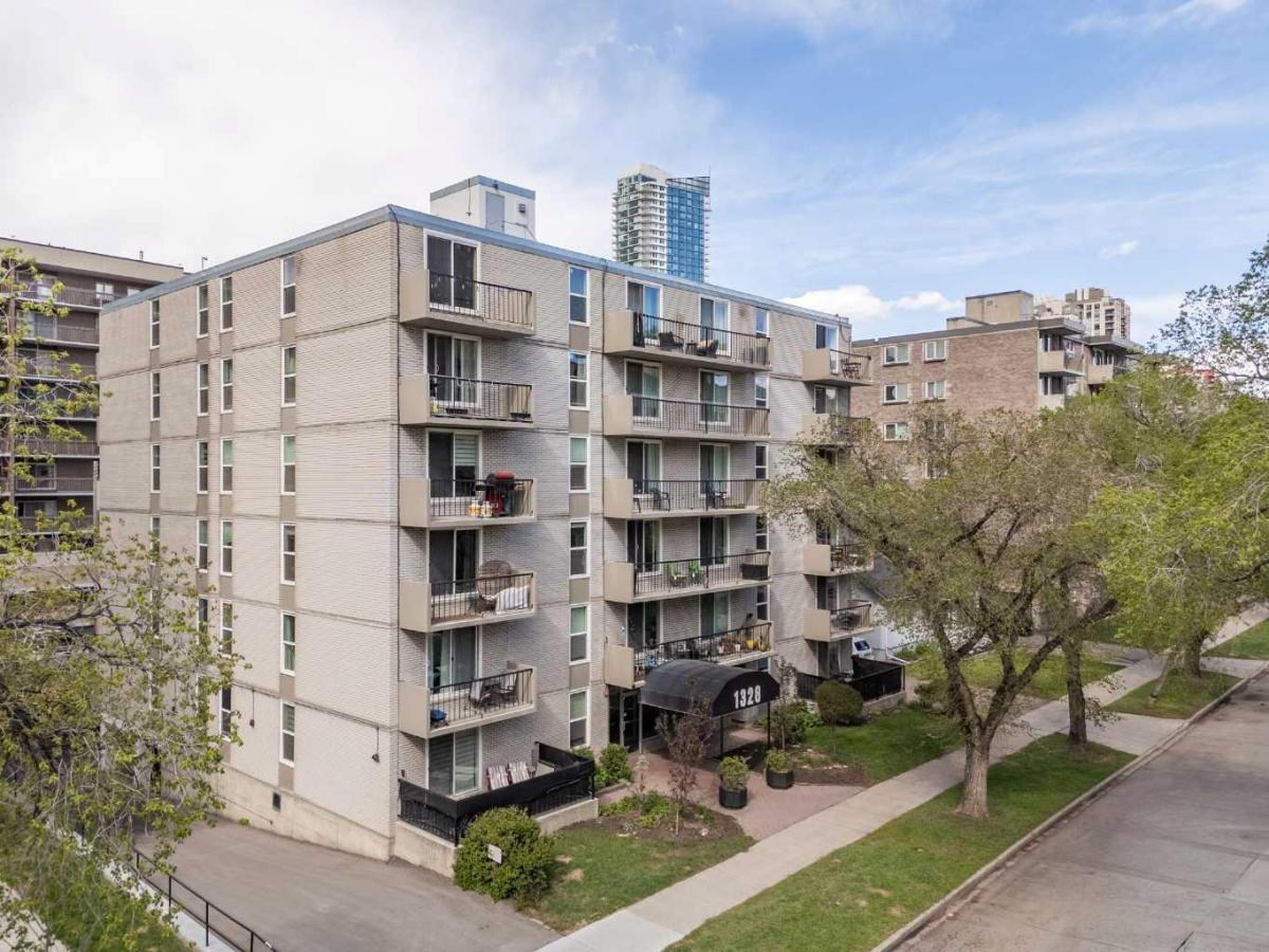 102, 1328 13 Avenue SW Calgary AB T3C 0T3 | MLS #A2313253 MLS #A2313253 image #0