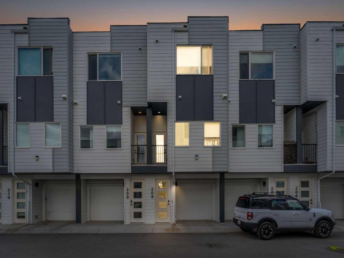 208, 101 Panatella Square NW Calgary AB T3K 2R9 | MLS #A2319096 MLS #A2319096 image #0