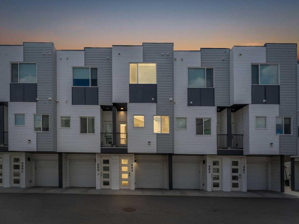 403, 101 Panatella Square NW Calgary AB T3K 2R9 | MLS #A2319097 MLS #A2319097 image #0
