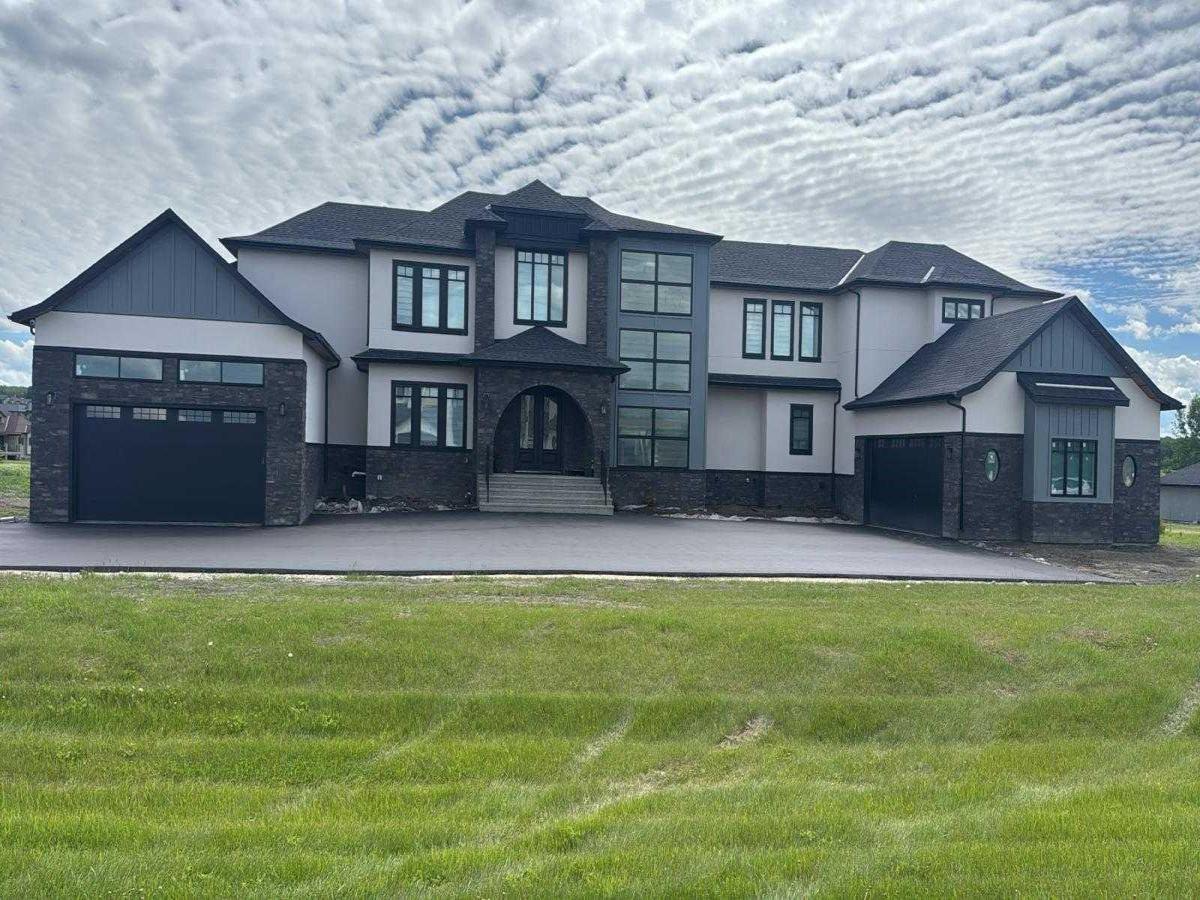 32030 Kodiak Springs Road Rural Rocky View County AB T4C 0B6 | MLS #A2321813 MLS #A2321813 image #0