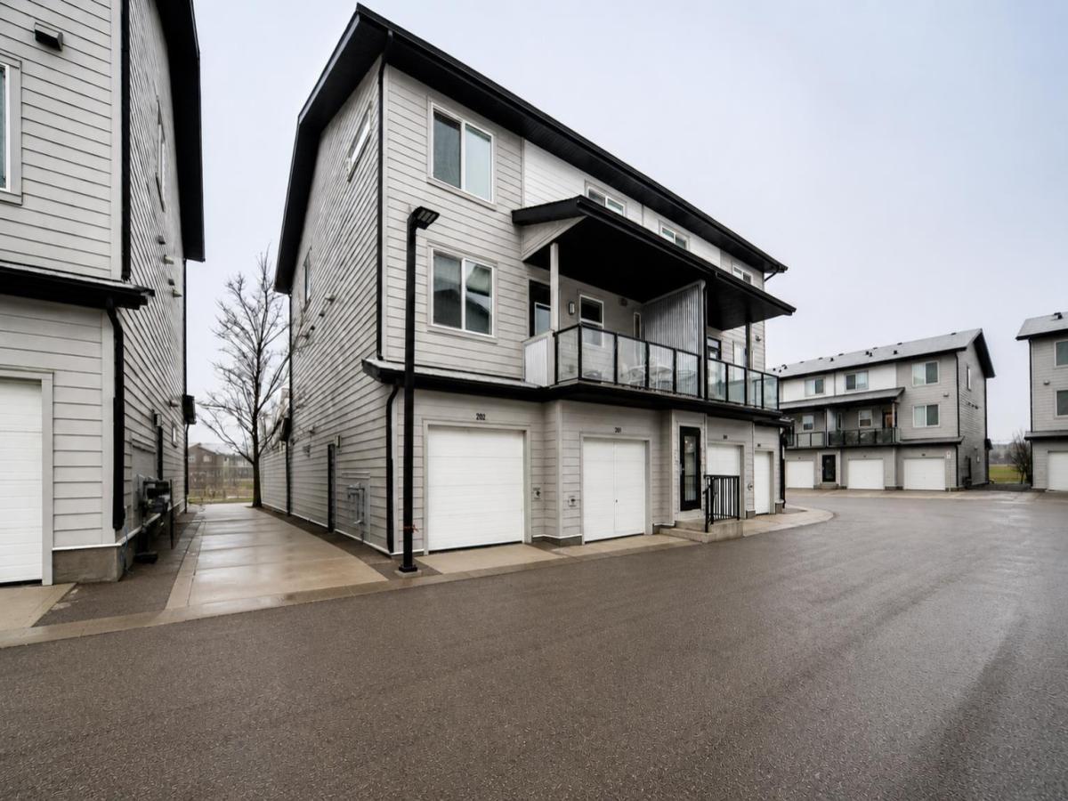202, 245 Redstone Walk NE Calgary AB T3N 1M6 | MLS #A2327755 MLS #A2327755 image #0