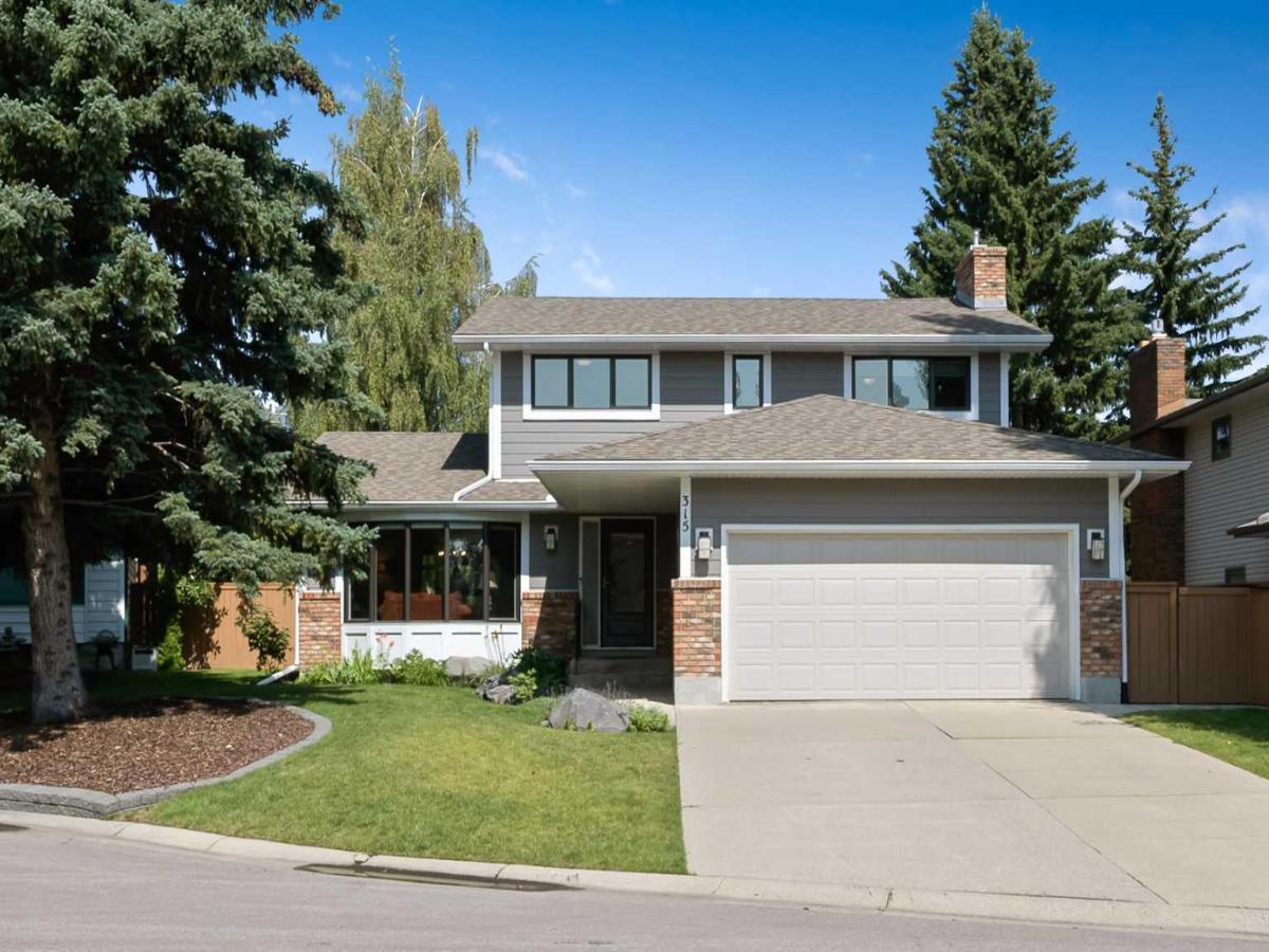 315 Woodpark Place SW Calgary AB T2W 2X9 | MLS #A2338172 MLS #A2338172 image #0