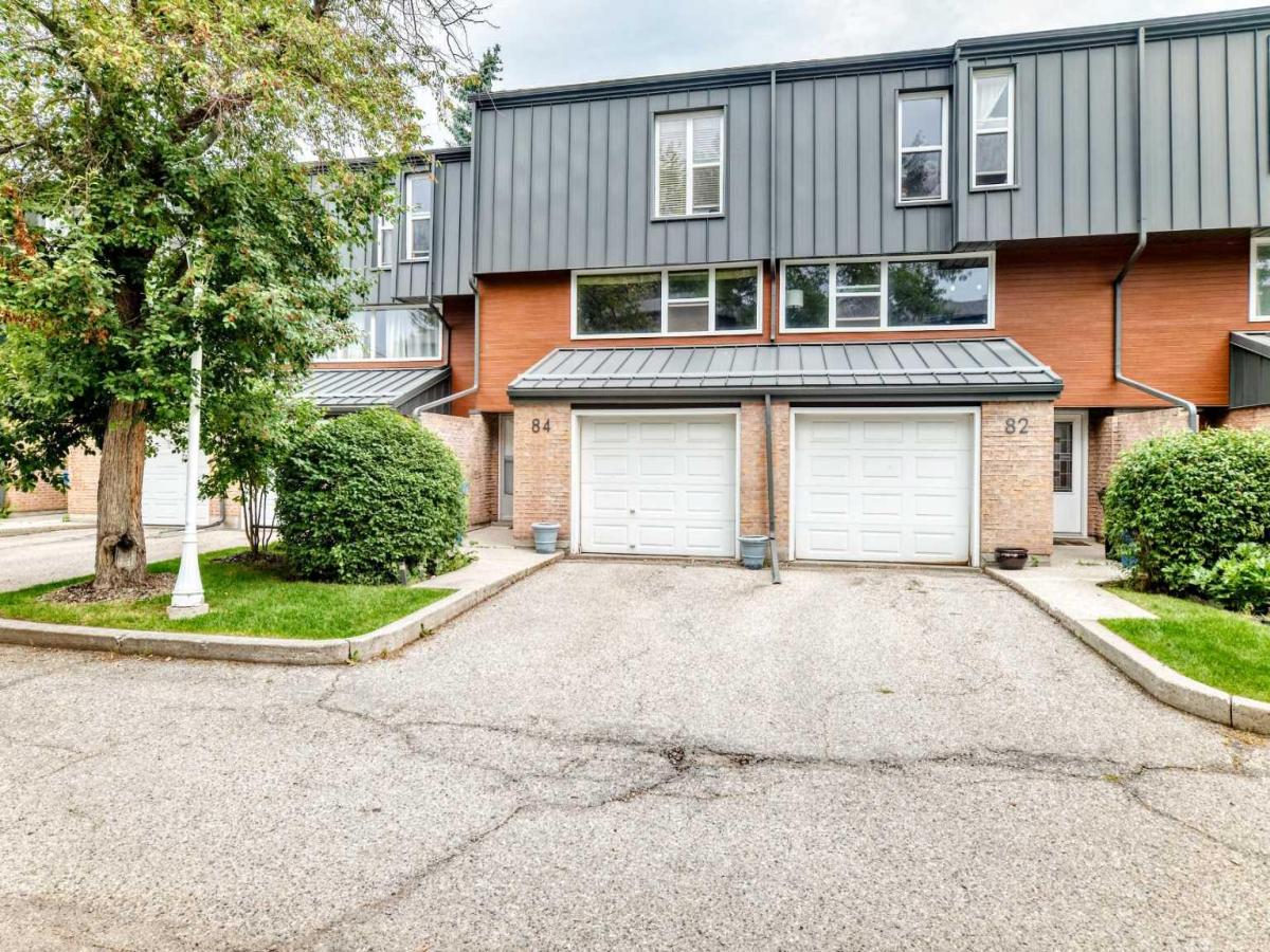 84 Brae Glen Lane SW Calgary AB T2W 1B6 | MLS #A2339552 MLS #A2339552 image #0