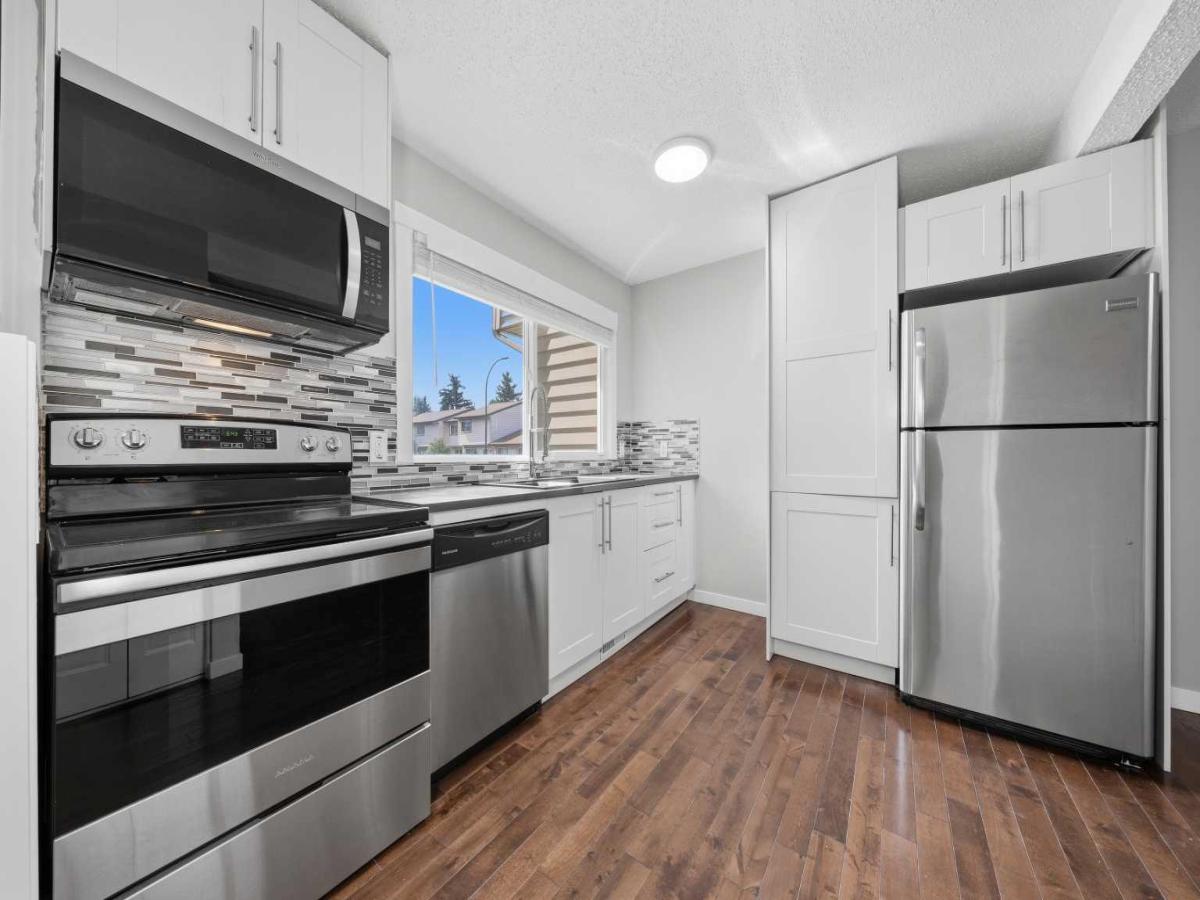 59, 6100 4 Avenue NE Calgary AB T2A 5Z8 | MLS #A2340679 MLS #A2340679 image #0