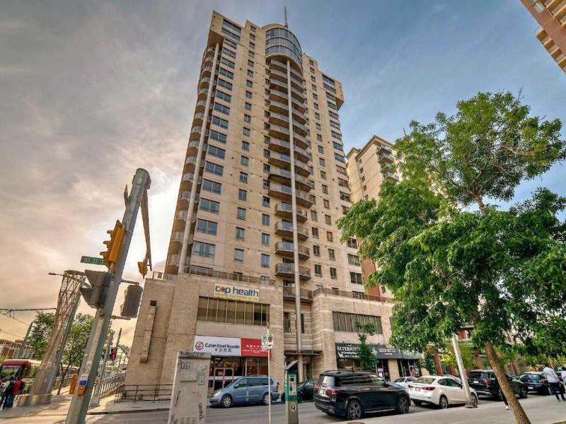 703, 683 10 Street SW Calgary AB T2P5G3 | MLS #A2343098 MLS #A2343098 image #0
