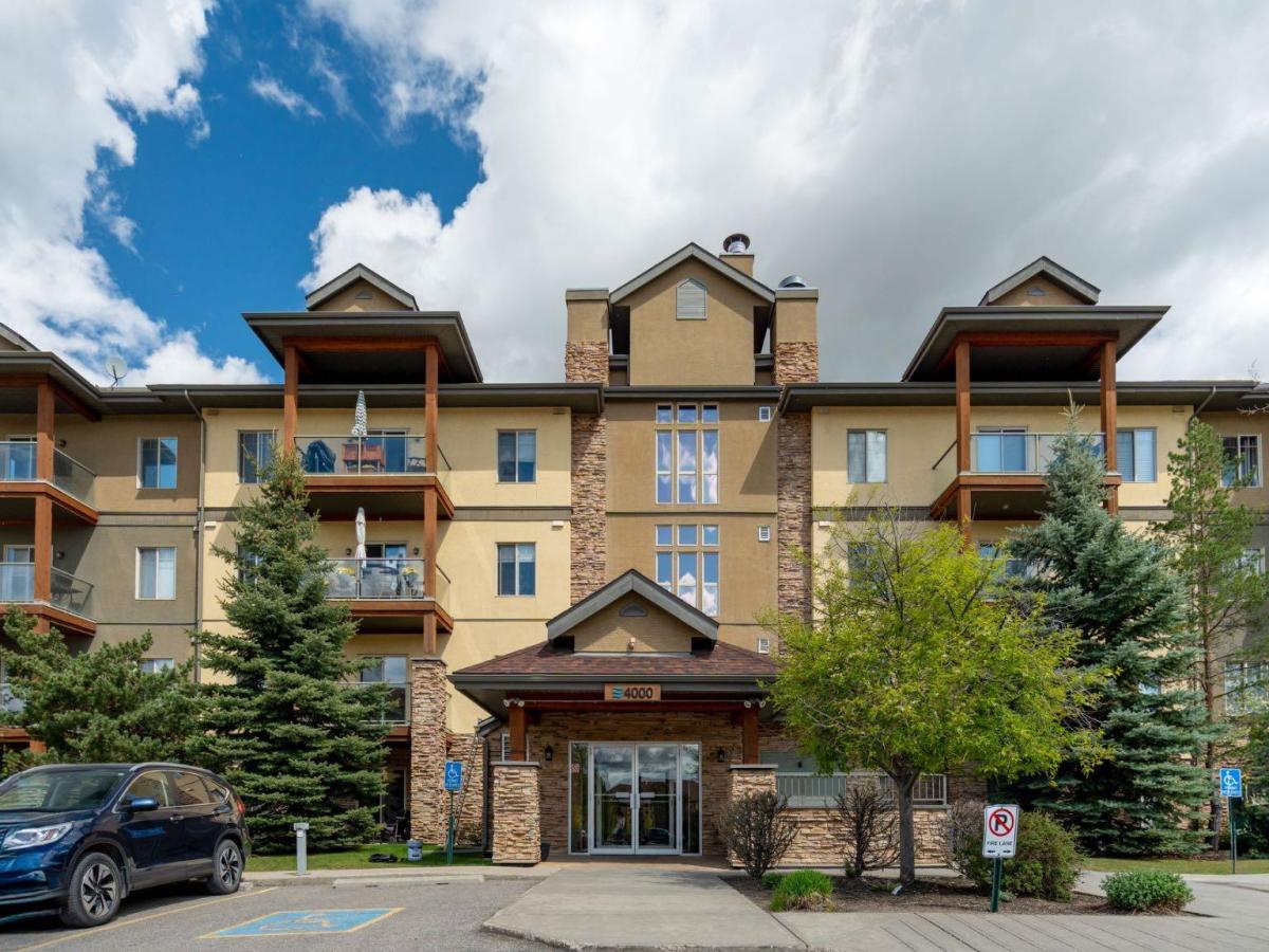 4214, 92 Crystal Shores Road Okotoks AB T1S 2N2 | MLS #A2344477 MLS #A2344477 image #0