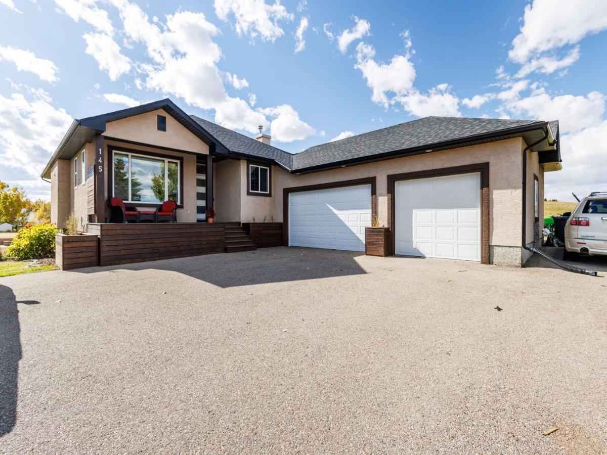 145 Sharp Hill Drive Rural Rocky View County AB T4A0P1 | MLS #A2349426 MLS #A2349426 image #0