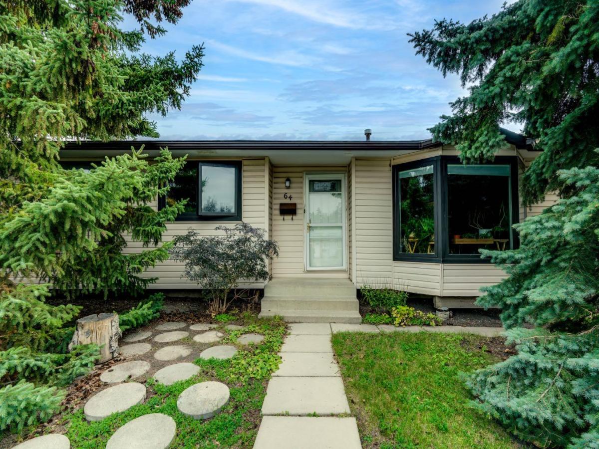 64 Huntham Road NE Calgary AB T2K 4G1 | MLS #A2352143 MLS #A2352143 image #0